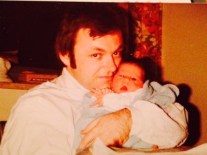 meg as new born with dad